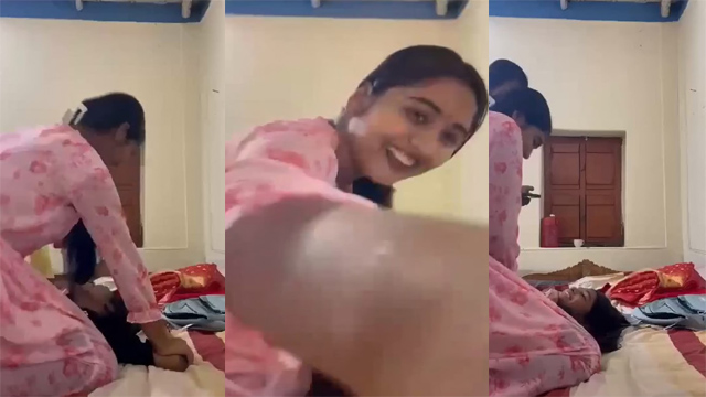 Young Girl Undressing By Her Friend
